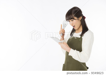 A woman with a tablet 9349023