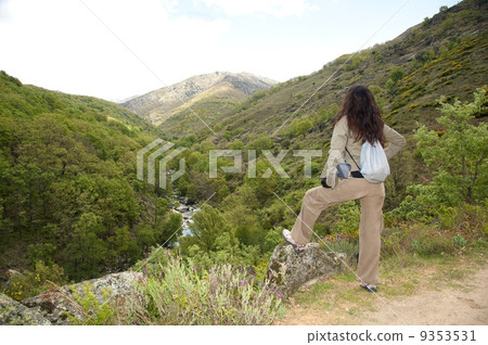 woman resting at the valley woman resting at the valley 9353531