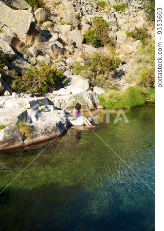 woman in a lake at Gredos 9353603