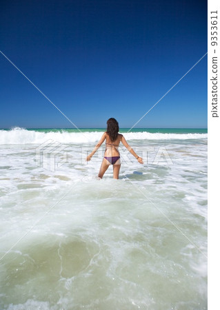 walking in water at Conil beach 9353611