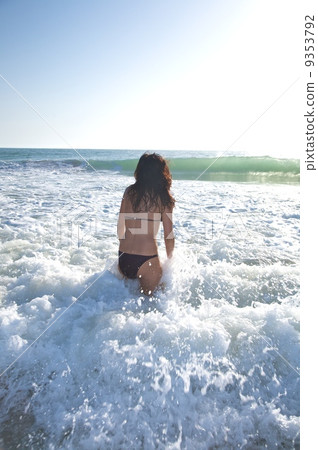 woman between sea foam 9353792