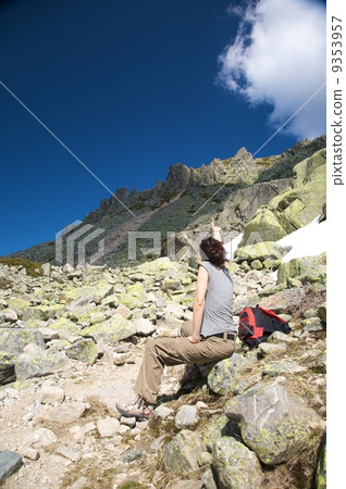 woman pointing peak woman pointing peak 9353957