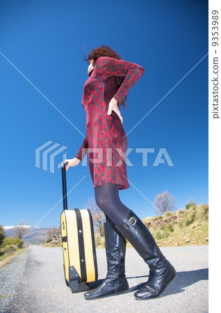 female traveller looking back 9353989
