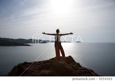 against the light woman at Menorca 9354303
