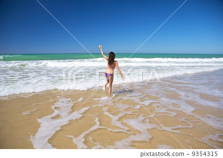jumping waves at Conil beach 9354315