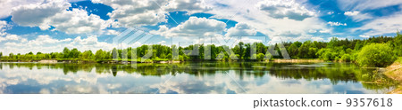 Clouds Reflection On Lake 9357618