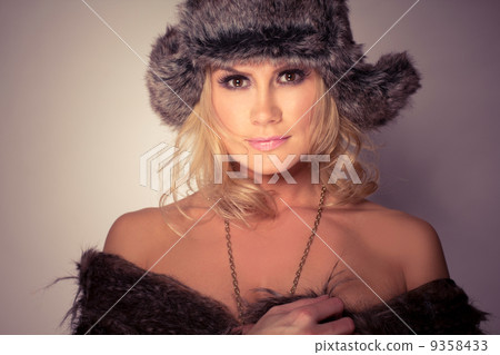 Fashion Wearing woman in fur Hat And Coat 9358433