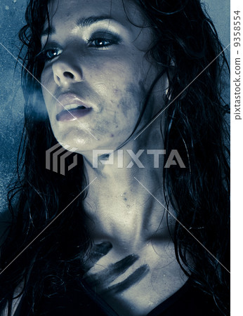 sexy model with wet skin and hair 9358554