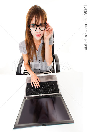 Young girl on the laptop 9359341