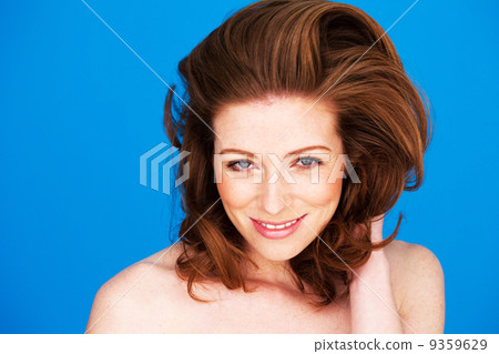 Smiling Woman With Auburn Hair Smiling Woman With Auburn Hair 9359629