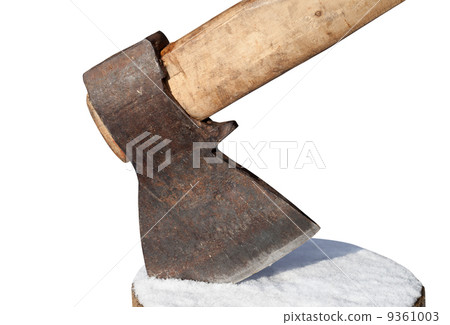 Axe and log with snow. Close-up view. Axe and log with snow. Close-up view. 9361003