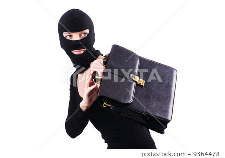 Industrial espionage concept with person in balaclava 9364478