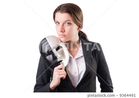 Woman with mask in hypocrisy concept 9364491
