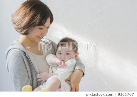 Baby and parents 9365767