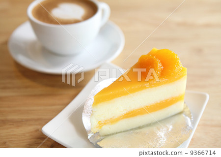Orange cake on wood background 9366714