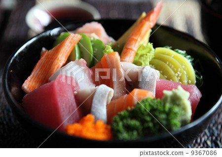 Sushi don , raw salmon tuna octopus on rice 9367086