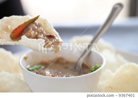 Thai food rice crust with pork white sauce Thai food rice crust with pork white sauce 9367401