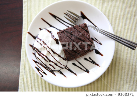 brownies on wood background brownies on wood background 9368371