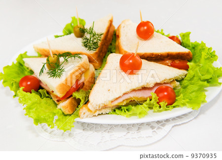 Eating on the run. Fresh and tasty home-made canape sandwiches Eating on the run. Fresh and tasty home-made canape sandwiches 9370935