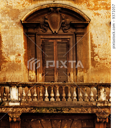 Vintage window and balcony Vintage window and balcony 9371057