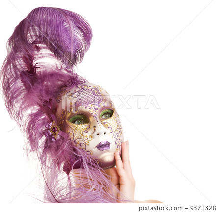 Beautiful young woman in carnival mask 9371328