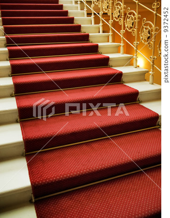 Stairs covered with red carpet Stairs covered with red carpet 9372452