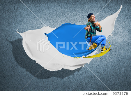 young male dancer jumping with splash of paint young male dancer jumping with splash of paint 9373276
