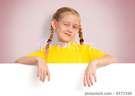 girl holding a white banner girl holding a white banner 9373380