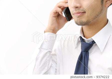 Male speaking on the phone Male speaking on the phone 9374222