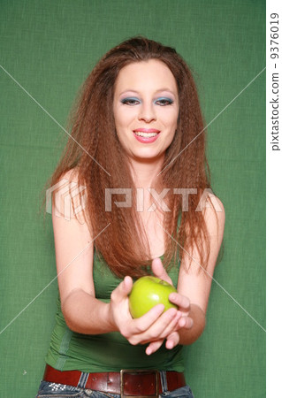 Beauty with green apple environmental concept Beauty with green apple environmental concept 9376019