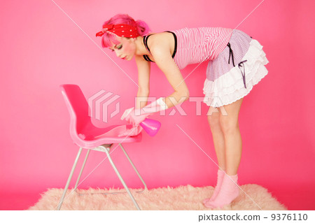 charwoman with pink hair working in pink room charwoman with pink hair working in pink room 9376110