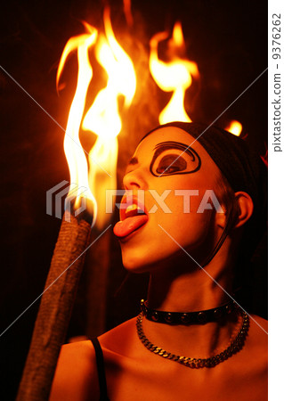 Fire Eater beauty woman Fire Eater beauty woman 9376262