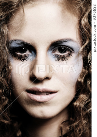 Beauty portrait with sad eyes 9376658
