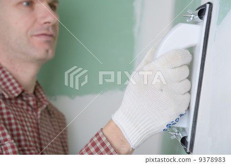 Sanding the drywall mud Sanding the drywall mud 9378983