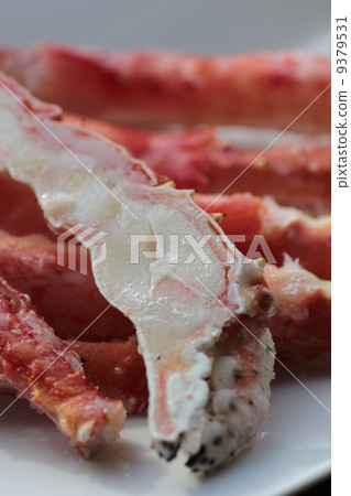 Boiled salted king crab legs being thawed. Crab delivered frozen. Boiled salted king crab legs being thawed. Crab delivered frozen. 9379531