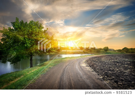 Country road and river Country road and river 9381523