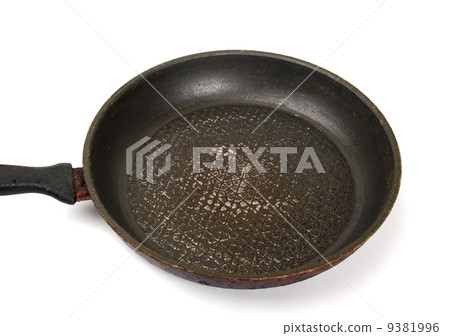 Dirty old frying pan on white background 9381996
