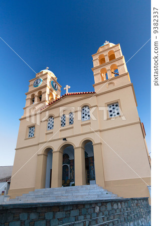 Yellow church and blue sky 9382337