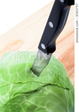 green cabbage vegetable with knife green cabbage vegetable with knife 9383757
