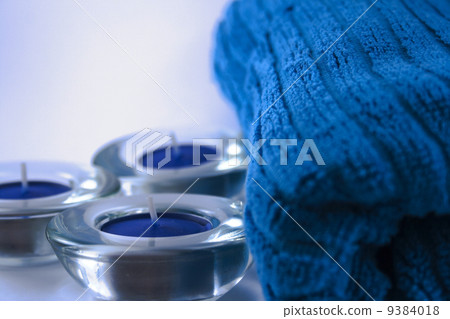 blue towel and three candles 9384018