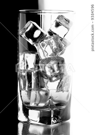 glass with ice cubes 9384596