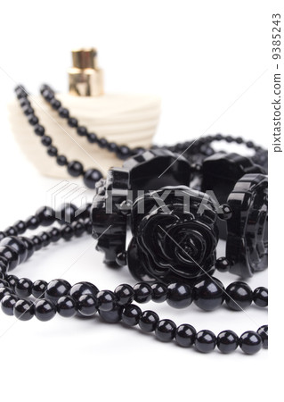 black necklace, bracelet and parfume 9385243
