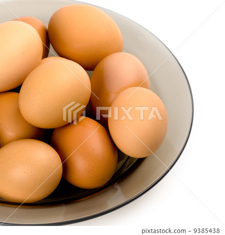 brown eggs in the plate 9385438