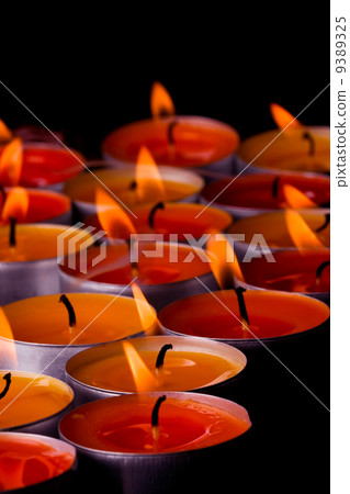 flaming candles flaming candles 9389325