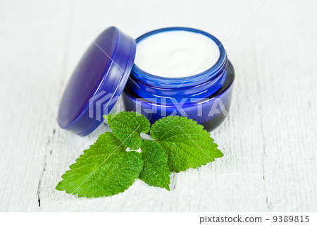 cream with green leaf cream with green leaf 9389815