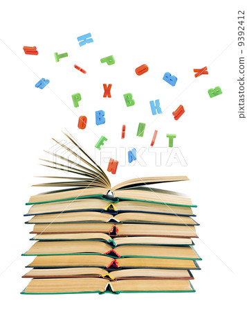 colorful letters flying out of an open book 9392412