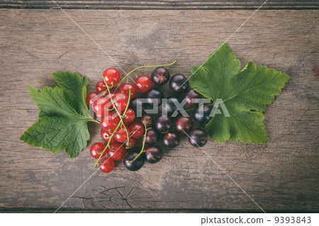 organic garden berries on old wood table 9393843