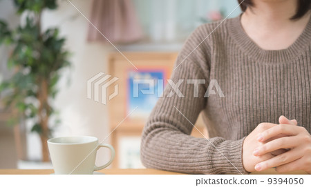 A woman at home A woman at home 9394050