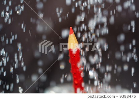 Red crayon under the rain 9398476