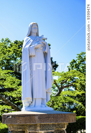 White Maria statue with blue sky3 9399474